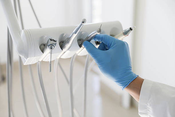 Professional Tooth Extraction technician working in Lake City, IA
